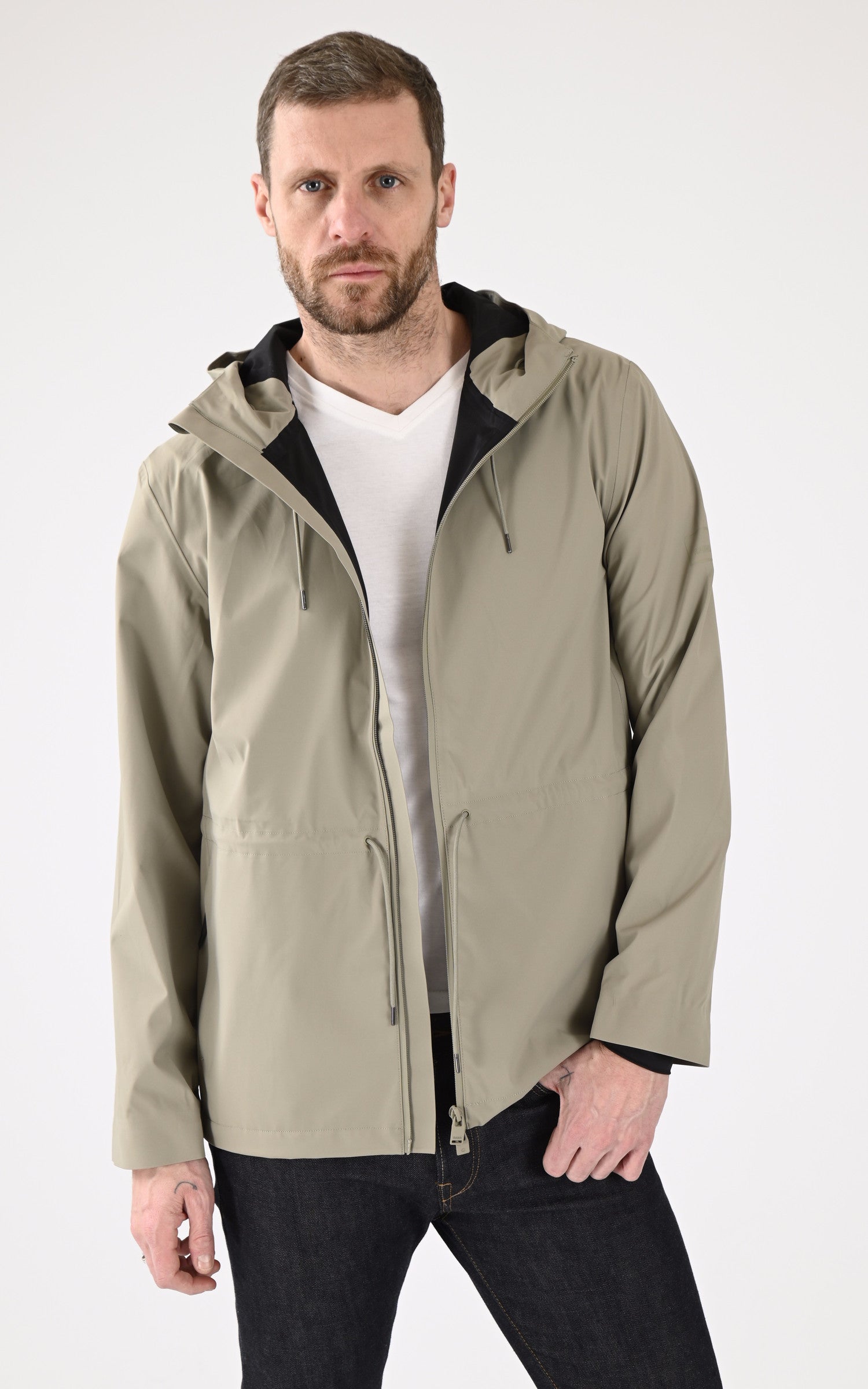 A "12470 SUVA HARDSHELL STRING" Kaki Rains Veste Mixte opened photo