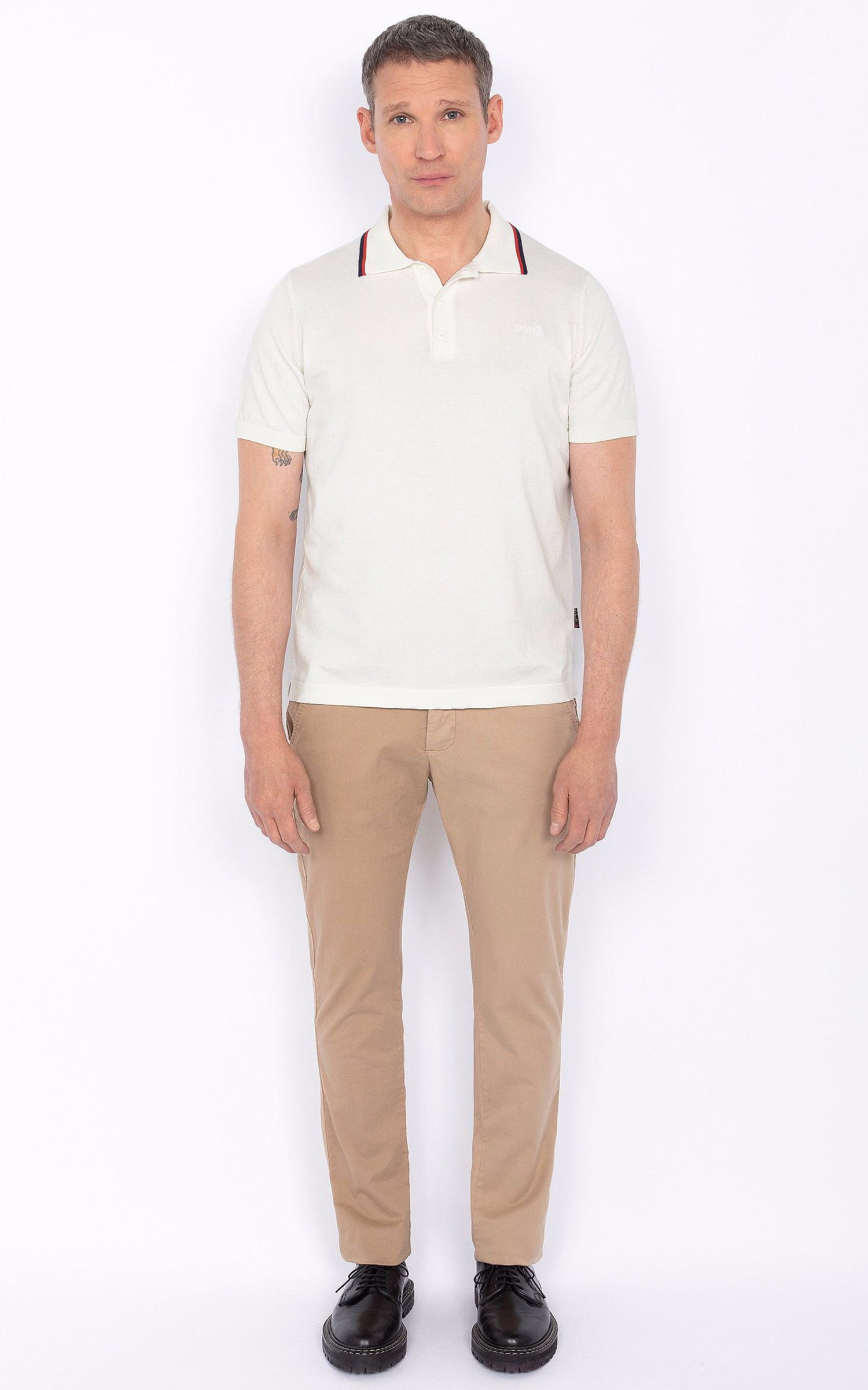 A "PSCAMRON" Blanc Schott Polo Homme closed photo