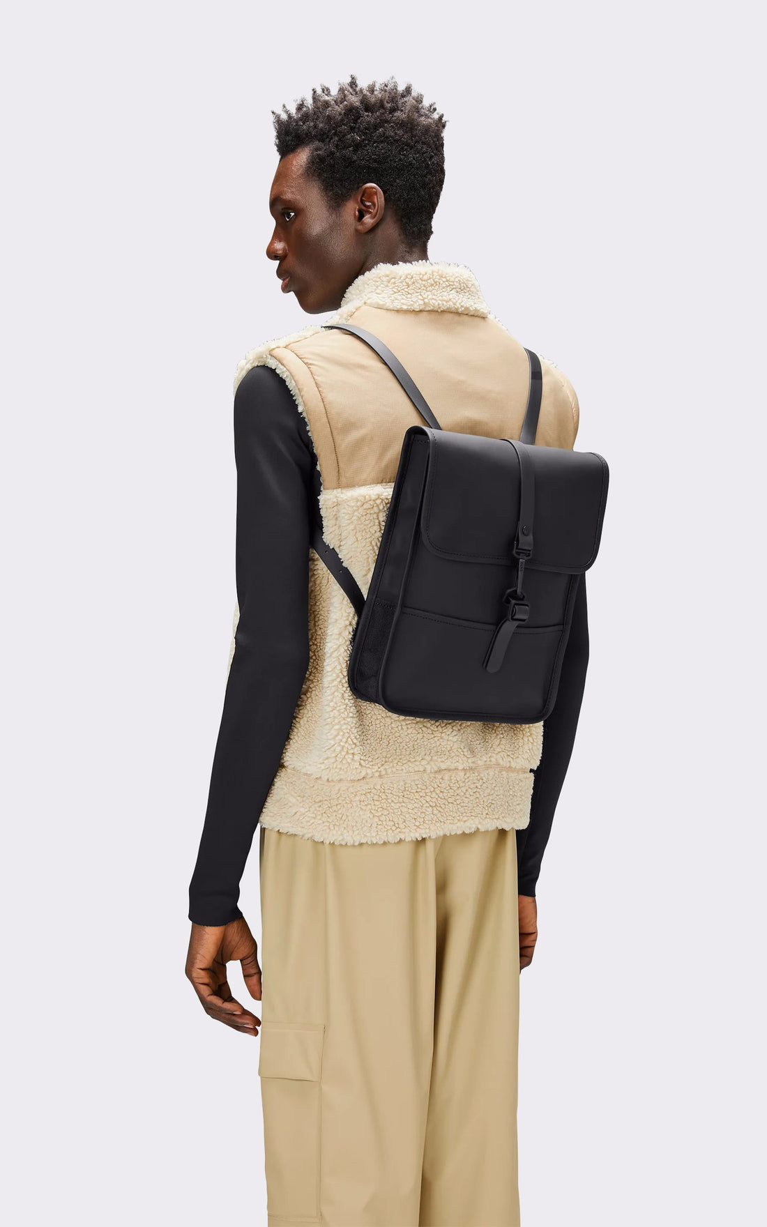 A "13010 BACK PACK MICRO" Noir Rains Sac A Dos Mixte opened photo