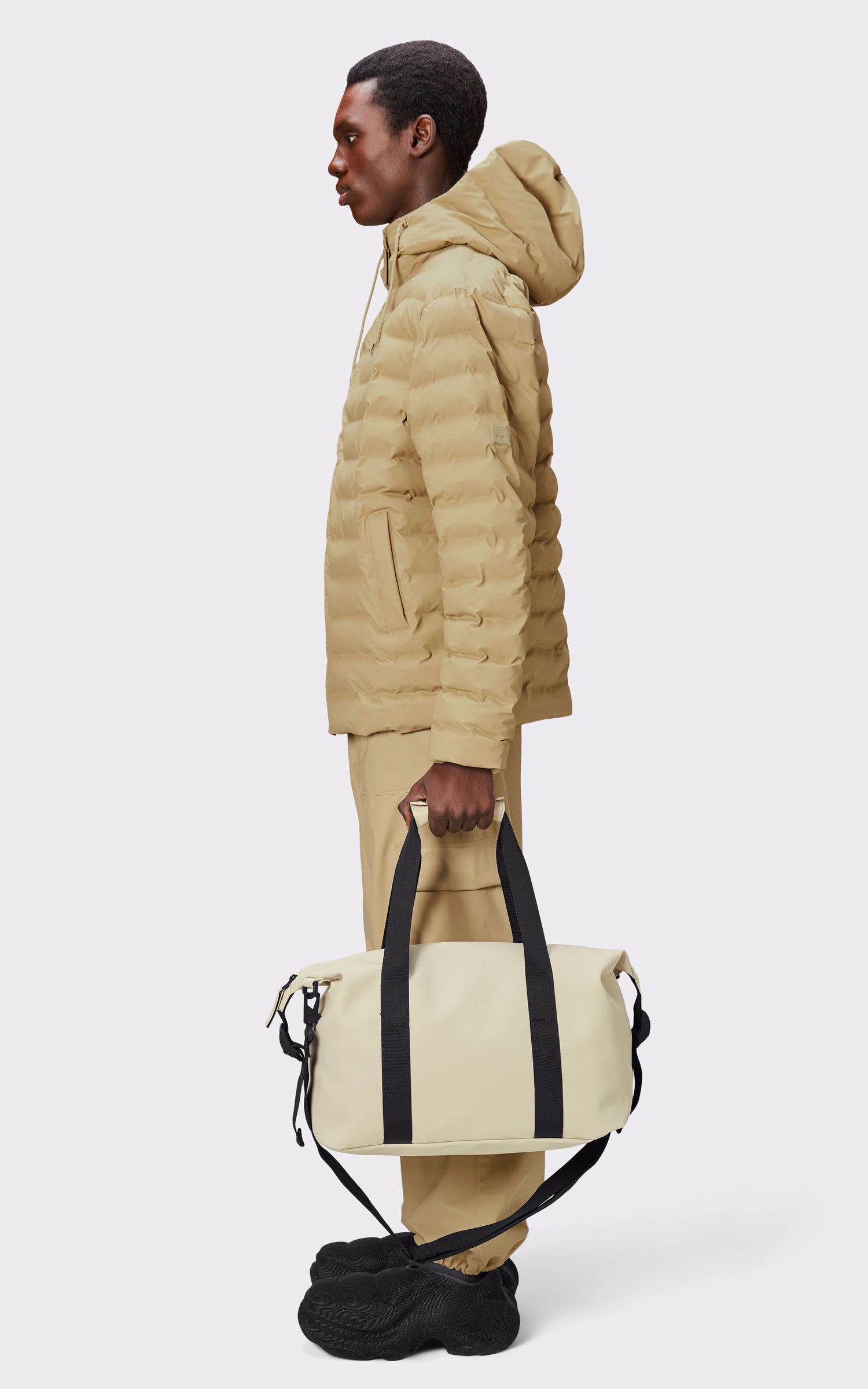 A "14220 WEEK-END BAG SMALL" Beige Rains Sac Mixte opened photo