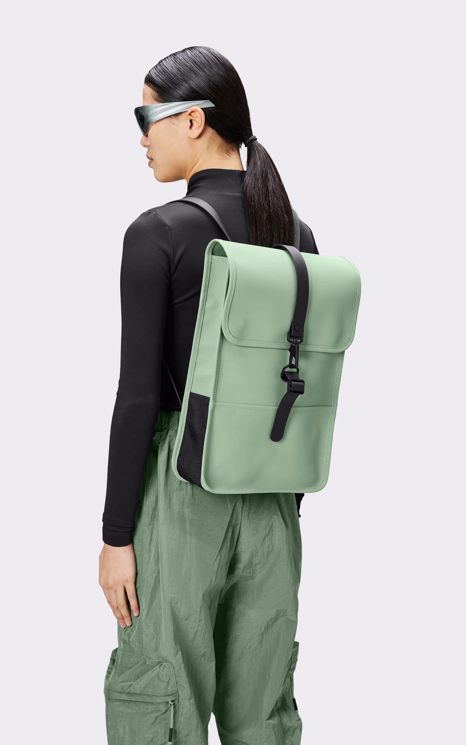 A "13020 BACK PACK MINI" Bleu Rains Sac A Dos Mixte closed photo