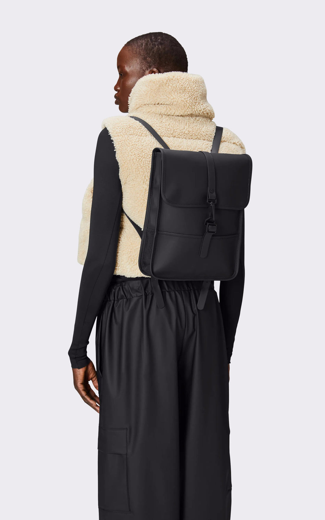 A "13010 BACK PACK MICRO" Noir Rains Sac A Dos Mixte opened photo