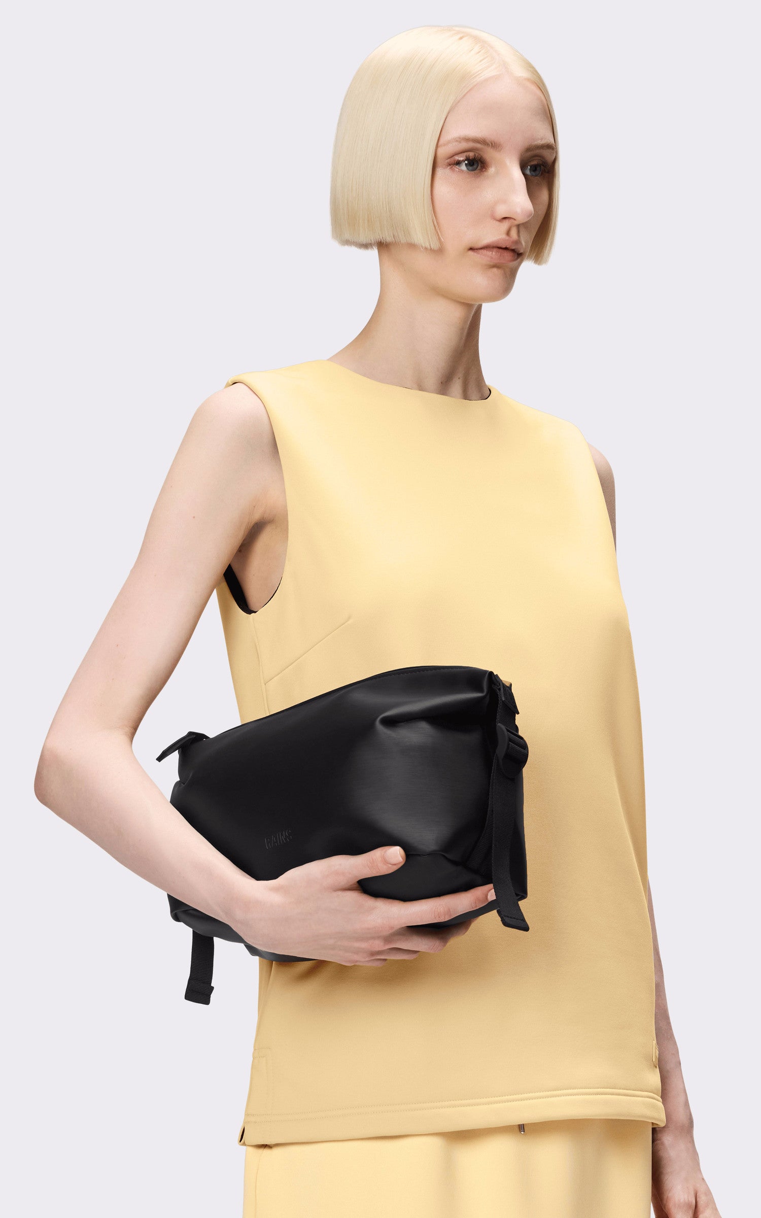 A "15630 WEEK-END HILO WASH BAG" Noir Rains Pochette Mixte interior photo