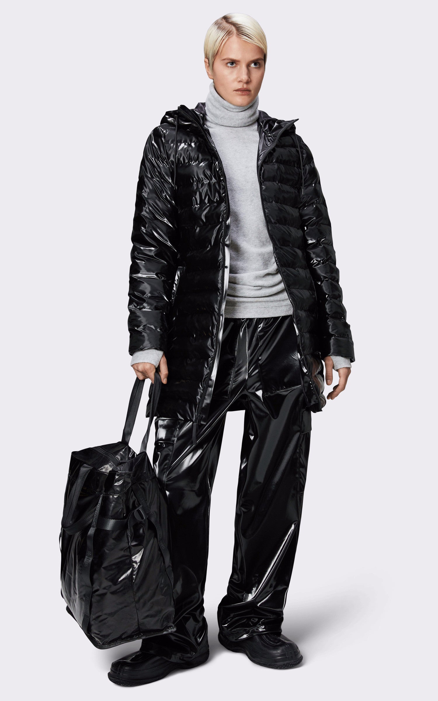 A "15890 LOHJA LONG PUFFER" Noir Rains 3/4 Doudoune Femme closed photo