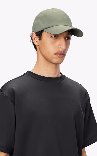 A &quot;13600 CASQUETTE&quot; Vert Rains Casquette Mixte opened photo