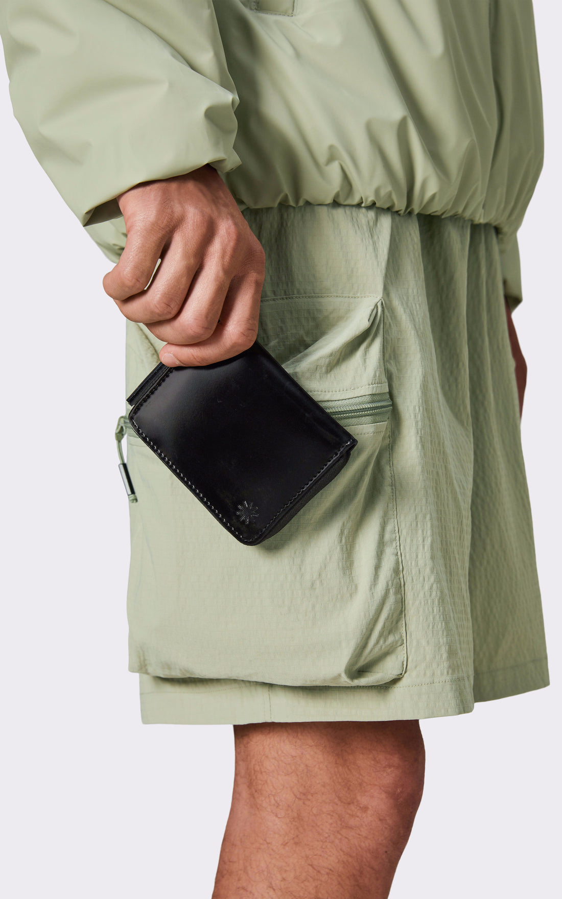 A &quot;16650 WALLET MINI&quot; Noir Rains Pochette Mixte closed photo