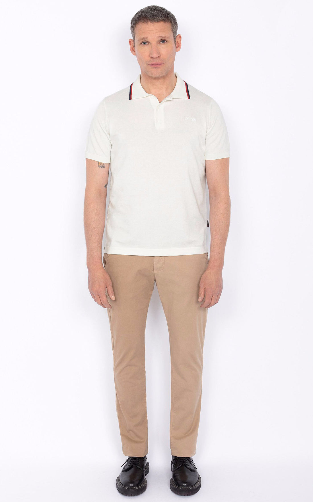 A &quot;PSCAMRON&quot; Blanc Schott Polo Homme opened photo
