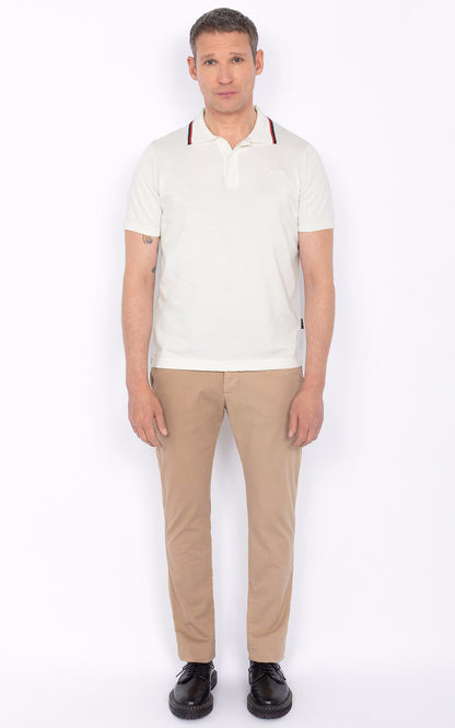 A &quot;PSCAMRON&quot; Blanc Schott Polo Homme closed photo