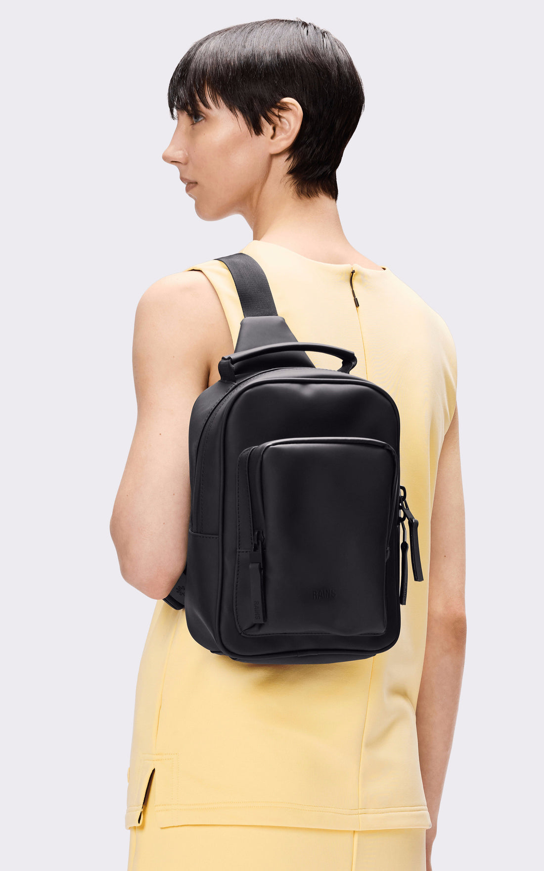 A &quot;13690 BOOK DAYPACK MINI&quot; Noir Rains Sac Mixte opened photo