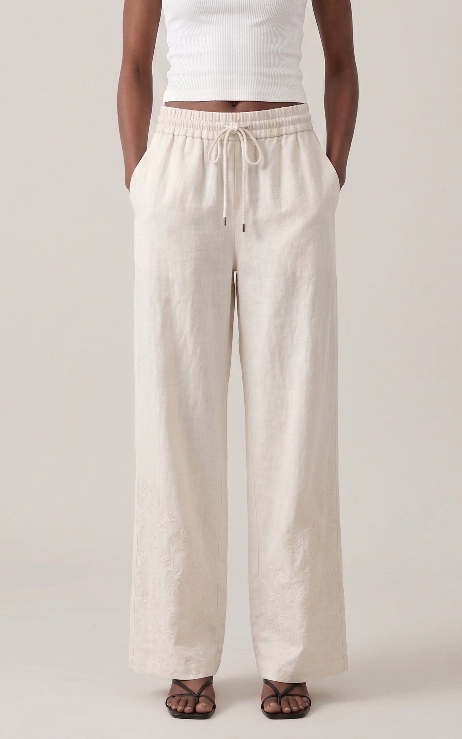 Esteban ecru lightweight trousers 1