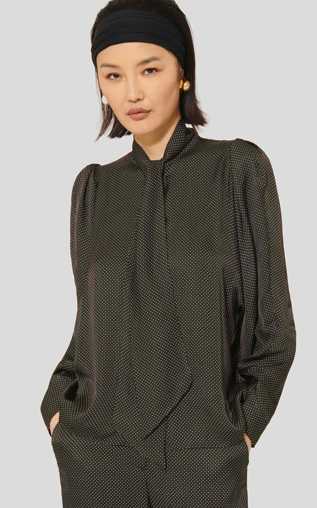Black polka dot shirt