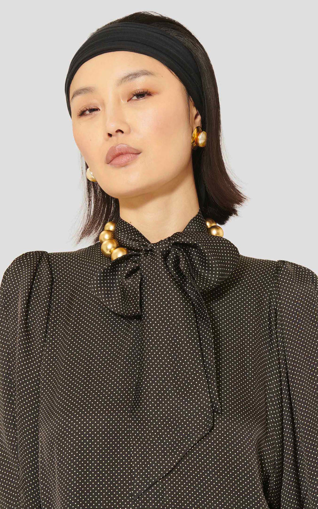 Black polka dot shirt