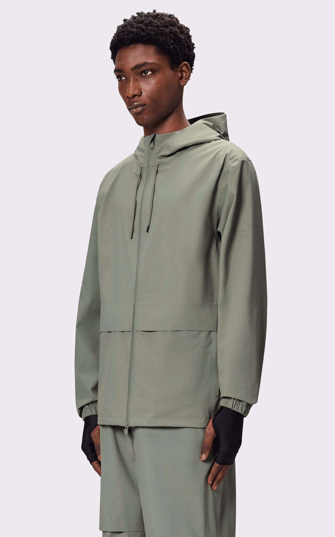 A &quot;12420 SUVA HARDSHELL POCKET&quot; Kaki Rains Veste Mixte closed photo