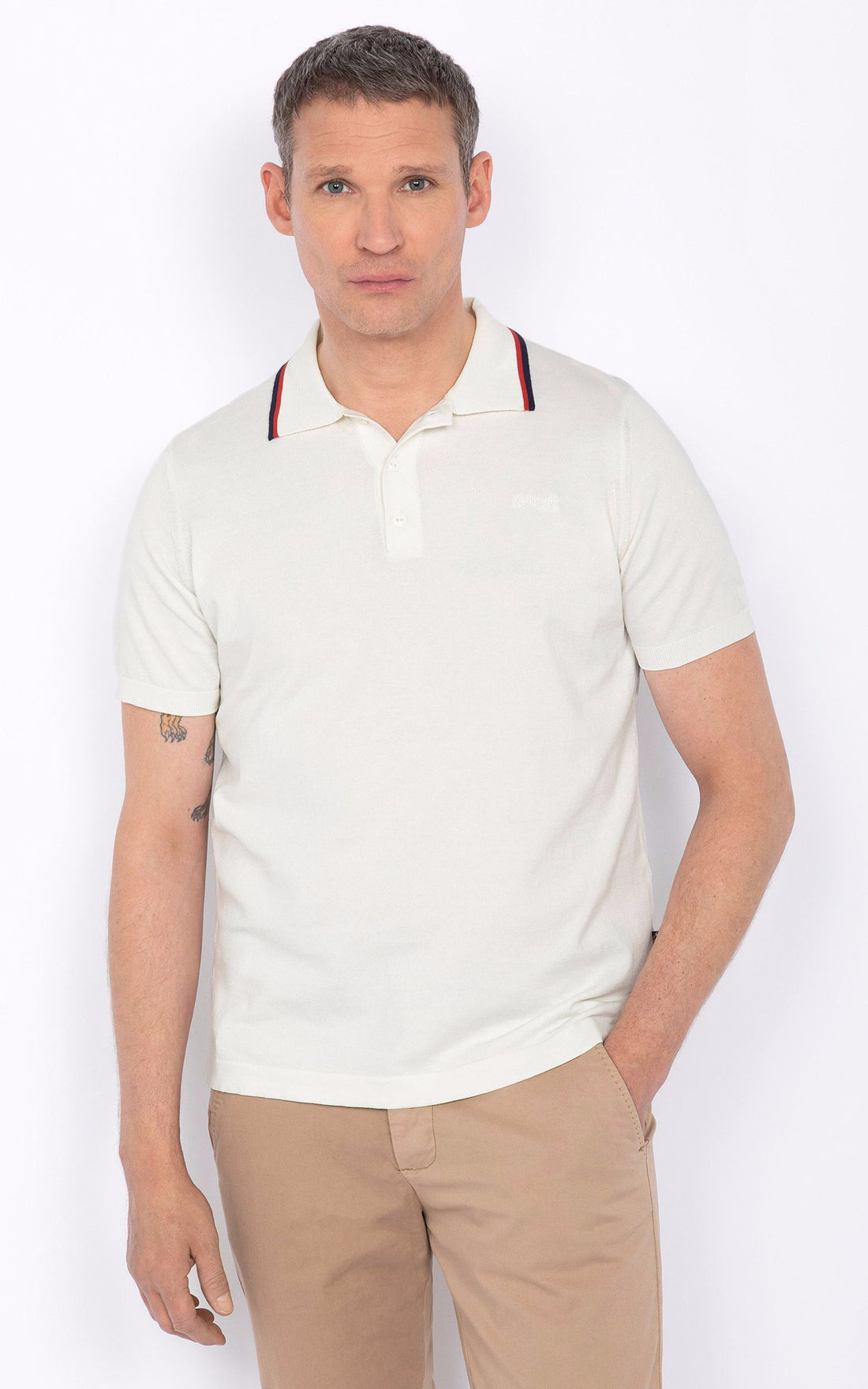 A &quot;PSCAMRON&quot; Blanc Schott Polo Homme opened photo